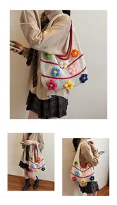 Detail of hand-woven crochet tote bag with colorful 3D flowers and red striped patterns