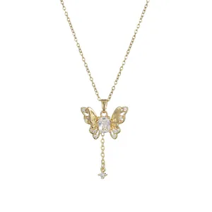 Elegant gold butterfly necklace with zircon pendant and sparkling central crystal stone