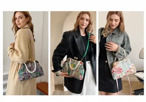 Vintage-Bügeltasche mit Blumenmuster in drei Tragevarianten: Schulter-, Umhänge- und Handtasche