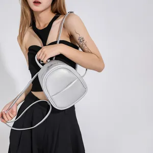 Mini silver metallic backpack for women with textured leather and adjustable straps