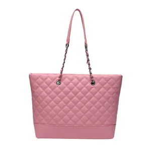 Elegant pale pink quilted tote bag with silver chain handles for women in 2025