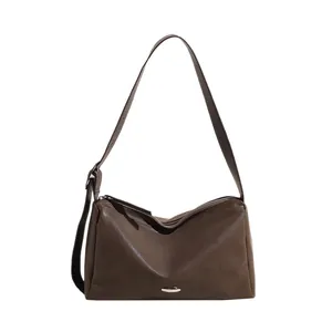 Vintage dark brown retro tote bag with adjustable strap and silver metallic hardware