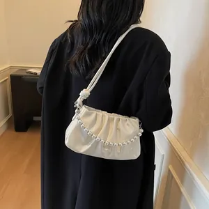 White pleated cloud bag for women with elegant pearl chain and knotted leather strap