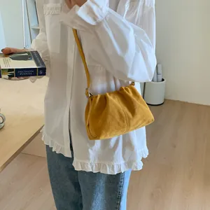 Fashionable yellow pleated suede crossbody dumpling bag for women with adjustable strap