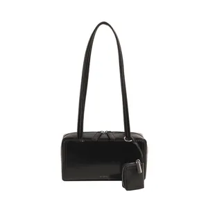 Elegant black glossy faux leather shoulder bag with a mini pouch and dual straps