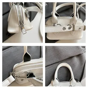 Détails du sac coquille en cuir verni blanc avec boucles, fermetures éclair et bandoulière