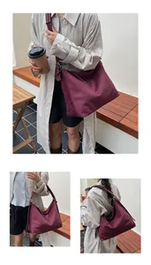 Detalle macro de bolso tote de gamuza burdeos con costuras finas y textura suave