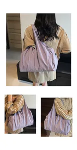 Detail view of large lavender canvas tote bag showing stitching and soft nylon texture