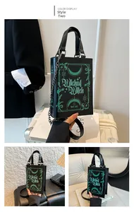 Detail view of the Wicked Witch book bag featuring a moon and star pattern with chain strap