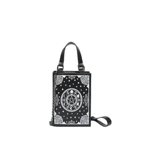 Vertical gothic crossbody phone bag with white pentagram, moon, and spider web prints