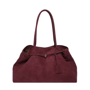 Large burgundy suede tote bag for women with elegant slim handles and minimalist design