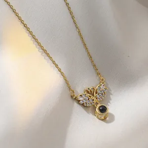 Elegant gold chain necklace with double swan pendant and 100 languages projection stone