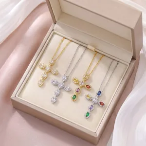 Chic cross pendant necklaces with colorful zircons on silk background, set of four