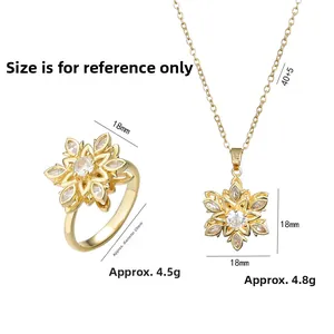 Goldschmuck-Set mit rotierender Zirkonia-Blume bestehend aus Kette und Ring
