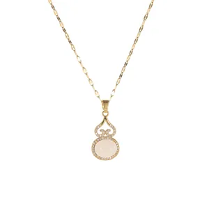 Vintage titanium steel necklace featuring a gold gourd pendant with sparkling pavé crystals