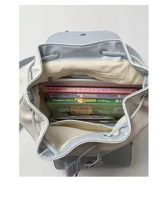 Top view of large capacity backpack interior showing laptop compartment and storage