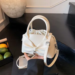 Niche Design PU Leather Bucket Bag For Women Large Bow Shoulder Bag With Drawstring Inner Pouch Heart Pendant Crossbody Bag