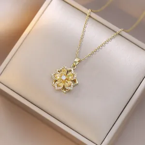Golden flower pendant necklace with yellow marquise zircons and six-petal rotating design