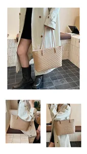 Detail of woven wheat straw tote bag showing herringbone texture and leather straps