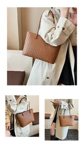Detail of the woven wheat pattern and slim shoulder strap on a brown tote bag
