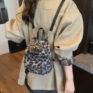 Mini leopard print faux fur backpack for women with golden zippers and black straps