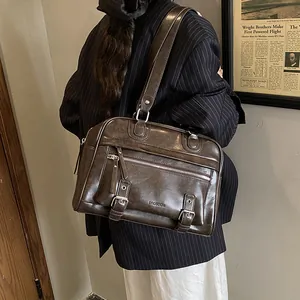 Retro dark brown leather pillow bag for women with silver buckles and zip pocket