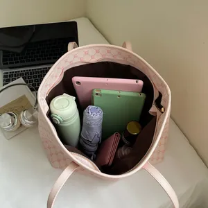 Pink printed tote bag with geometric patterns and large storage capacity for daily commute