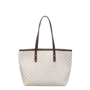 Retro monogram tote bag with brown handles and a spacious trapezoid design for women