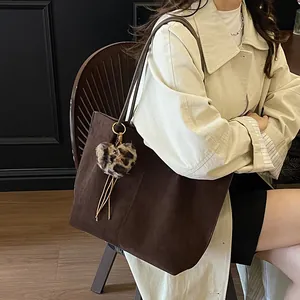 Retro dark brown suede tote bag with leopard heart charm and tassel for daily commute