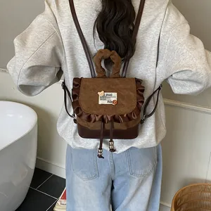 Mini vintage leopard cat backpack with ruffle edge and drawstring in brown patchwork