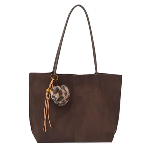 Dark brown large capacity tote bag with leopard plush ball and tassel charm