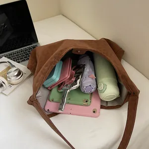 Brown matte leopard tote bag with large capacity, showing a tablet, bottle, and umbrella