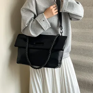 Retro large black PU leather hobo bag with thick rope handle for stylish commuting