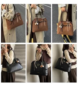 Detailed views of a large suede tote bag with belt detail and gold buckle accents
