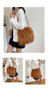Detailed view of the brown faux fur crossbody bag with adjustable slim leather shoulder strap