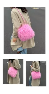 Three-way view of a bright pink fluffy faux fur crossbody bag with adjustable strap