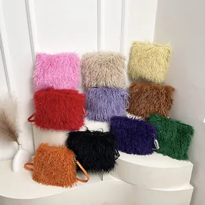 Furry plush crossbody bags in ten colors with adjustable leather straps on display