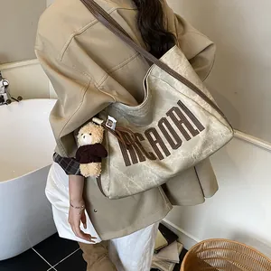 Retro canvas tote bag with ICAOAI letter design and cute bear charm pendant