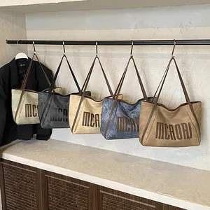 Retro oversized tote bags collection in five colors with MCAORI lettering and leather straps