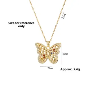 Detailed view of butterfly pendant with multi-colored gems and hollow mesh wing design