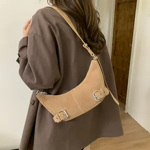 Retro camel suede half-moon shoulder bag with silver metallic buckle details