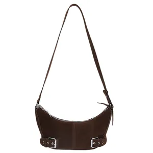 Vintage brown hobo shoulder bag with suede texture and silver buckles for women