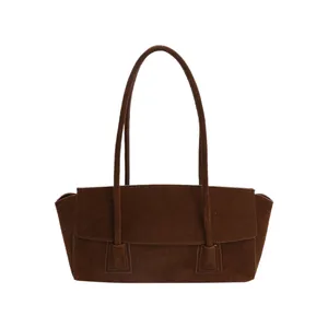 Minimalist brown suede shoulder bag with long straps and sleek rectangular design