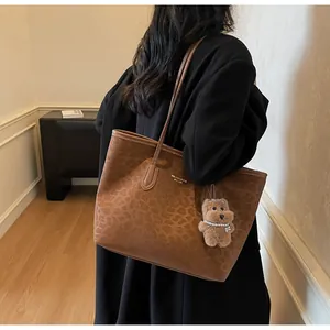Leopard print large capacity tote bag with plush bear charm and thin shoulder straps