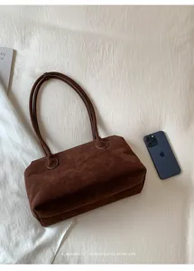 Minimalist large capacity dark brown suede retro shoulder bag with smartphone for scale