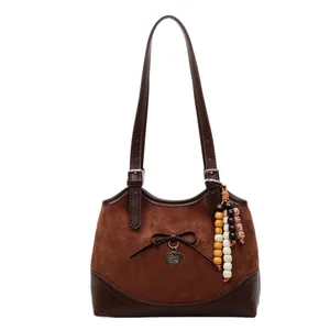 Retro brown suede tote bag with leopard lining accents and beaded heart charm
