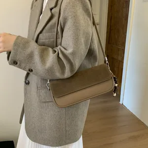 Retro patchwork rectangular baguette bag in coffee tones with wooden bead charm
