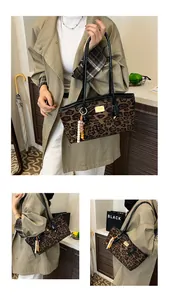 Detailed views of leopard print tote bag with black glossy handles and gold nameplate