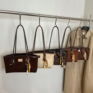 Large vintage suede tote bags in solid colors and leopard prints with beaded charms