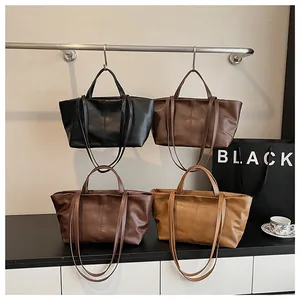 Detailed comparison of minimalist large tote bags in black, chocolate, tan, and khaki colors